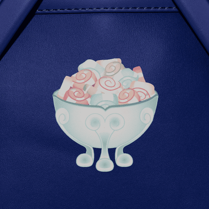 Decorative bowl with pink roses on a blue leather surface