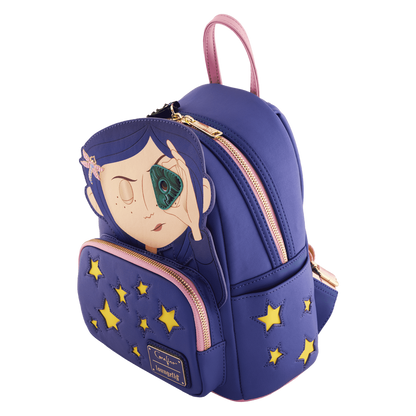 Blue backpack with star patterns and a character design on a white background
