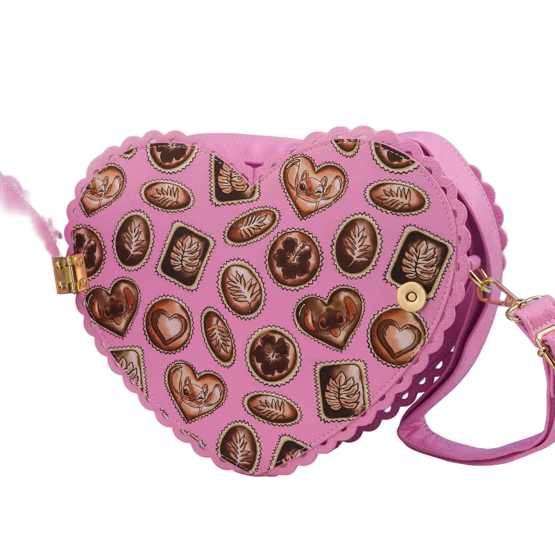 Pink heart-shaped bag with chocolate design on a pink background