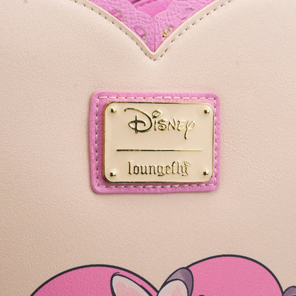 Close-up of a Disney Loungefly product with a gold label on a beige background.