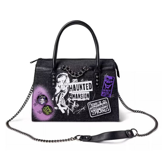 Black handbag with 'The Haunted Mansion' theme and chain strap on a white background