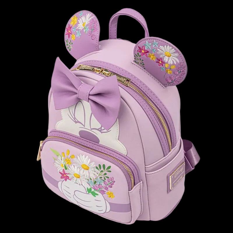 Purple backpack with floral design and bow on a white background