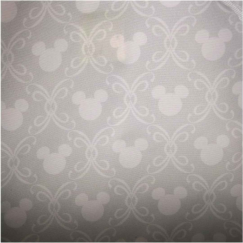 Patterned fabric with repeated design on a gray background