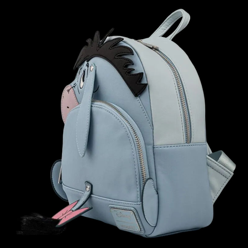Blue backpack with Eeyore design on a white background