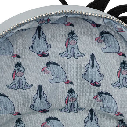 Close-up of a bag with Eeyore pattern on a light gray background