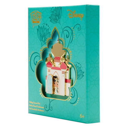 Disney castle pin in a teal box with decorative elements