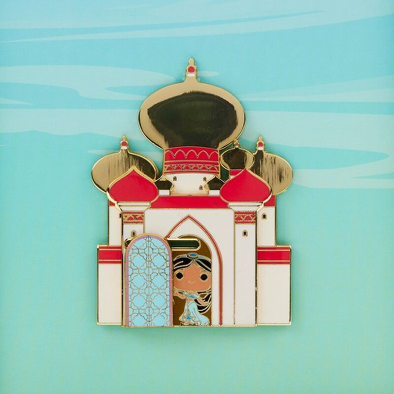 Enamel pin of a castle with a character in front on a light blue background