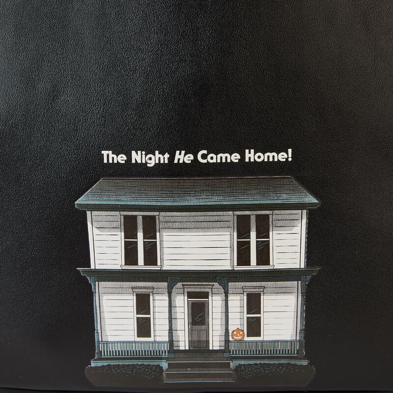 Model of a two-story house with a pumpkin on a black background and text 'The Night He Came Home!'.