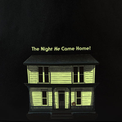 Glowing house model with text 'The Night He Came Home!' on a black background