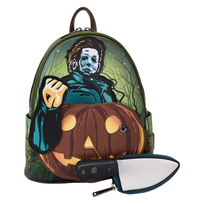 Backpack with Halloween-themed design featuring a character and pumpkin, on a white background.
