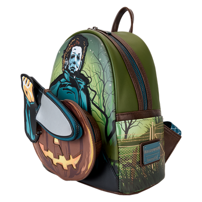 Backpack with Halloween-themed design featuring a masked figure and jack-o'-lantern.