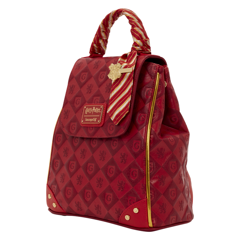 Red backpack with gold accents and a candy cane design on a green background