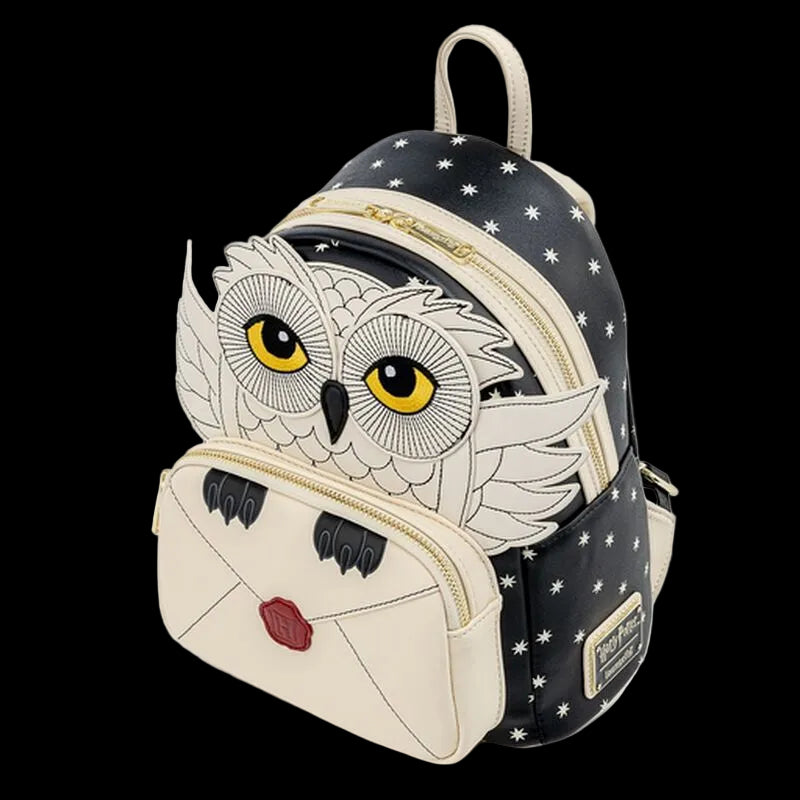 Owl-shaped backpack with star pattern on a white background