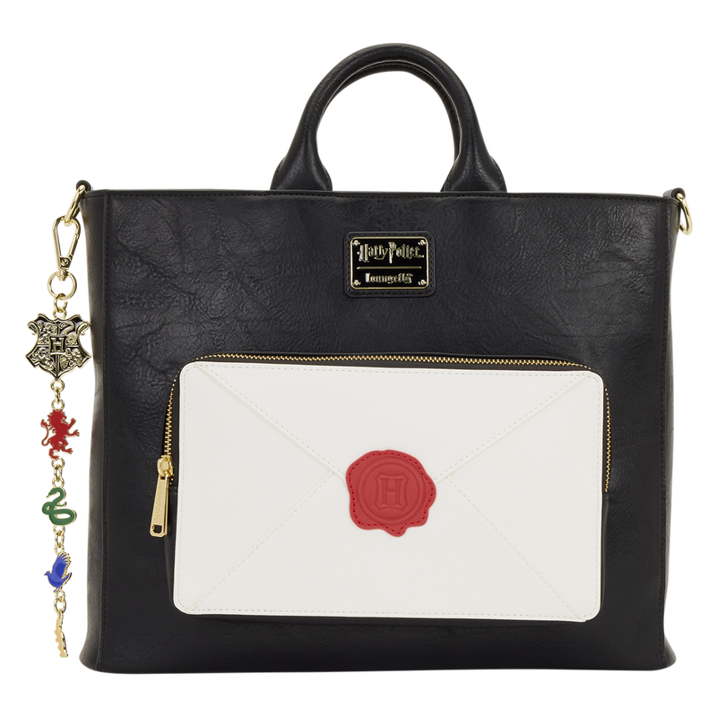 Black handbag with a white pocket featuring a red seal, Harry Potter logo, and charm strap on a white background.