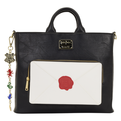 Black handbag with a white pocket featuring a red seal, Harry Potter logo, and charm strap on a white background.