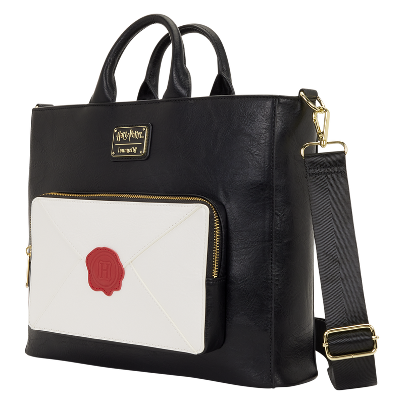 Black handbag with a white pocket featuring a red seal, Harry Potter logo on a gold background.