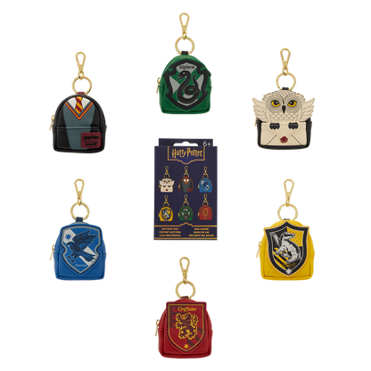 Set of Harry Potter-themed keychains with different houses on a white background