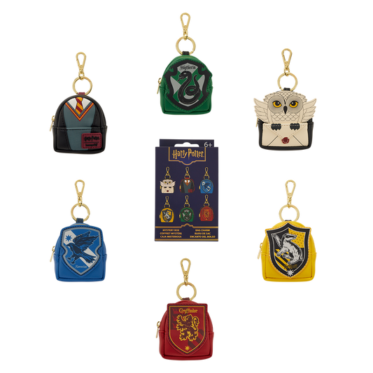Set of Harry Potter-themed keychains with different houses on a white background