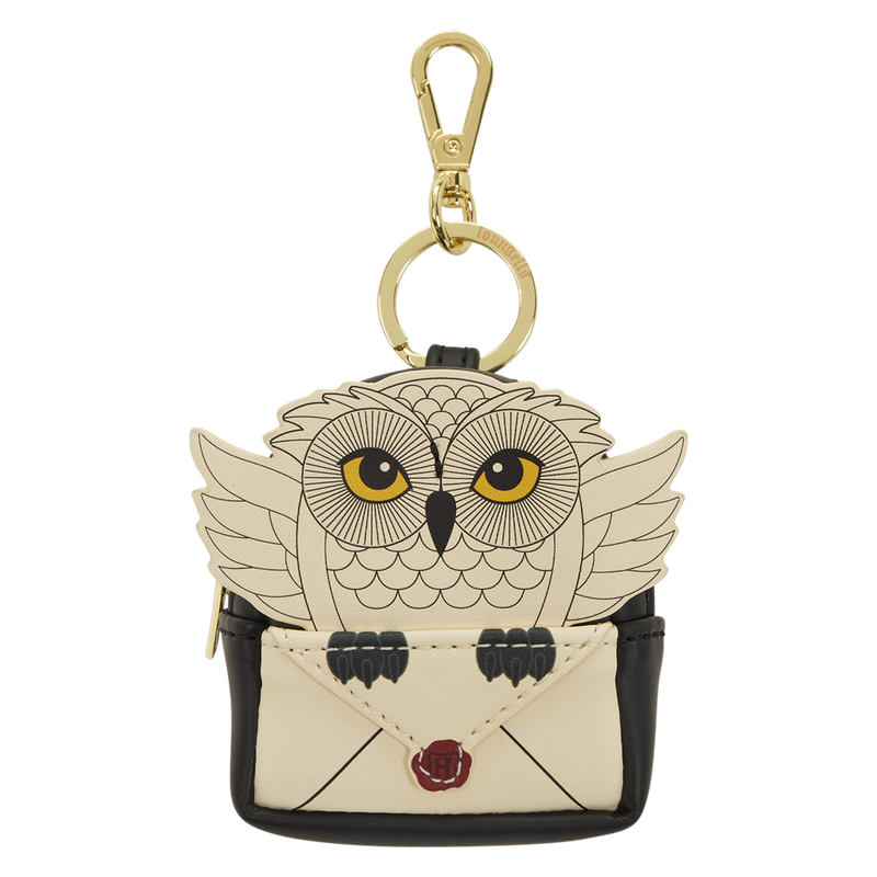 Owl-shaped keychain with a gold clasp on a white background