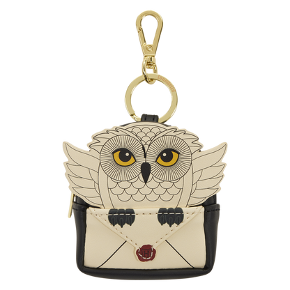 Owl-shaped keychain with a gold clasp on a white background