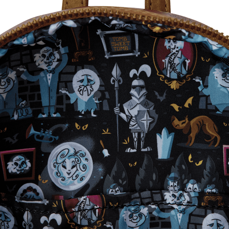 Close-up of a bag with a detailed Halloween-themed design featuring skeletons, cats, and other spooky elements.