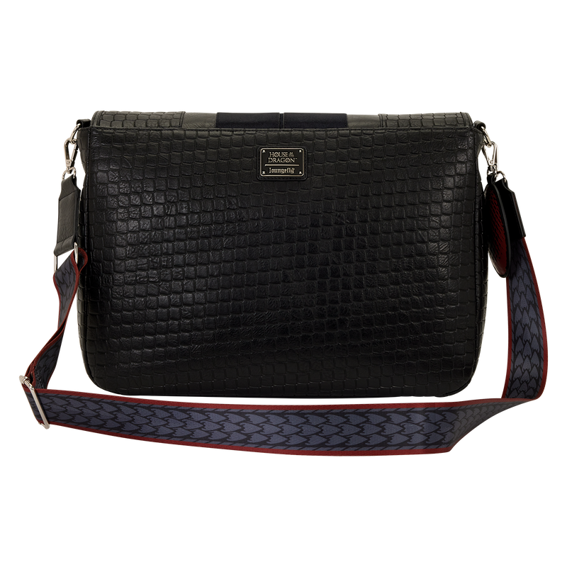 Black textured handbag with a patterned strap on a white background