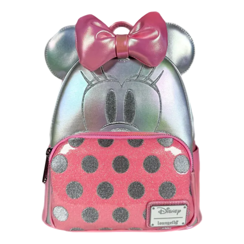 Backpack with Minnie Mouse design featuring silver ears, pink bow, and polka dot pattern on a white background.