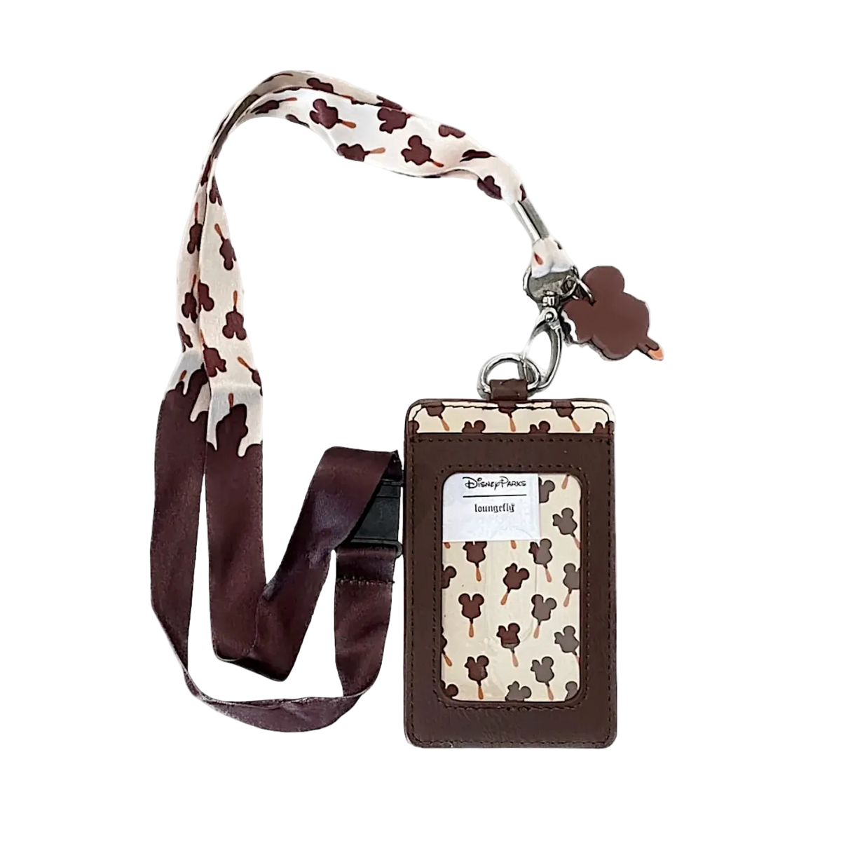 A Disney-themed employee ID badge holder with a matching lanyard. The holder features a brown faux-leather border and a cream fabric insert patterned with brown Mickey Mouse silhouettes.