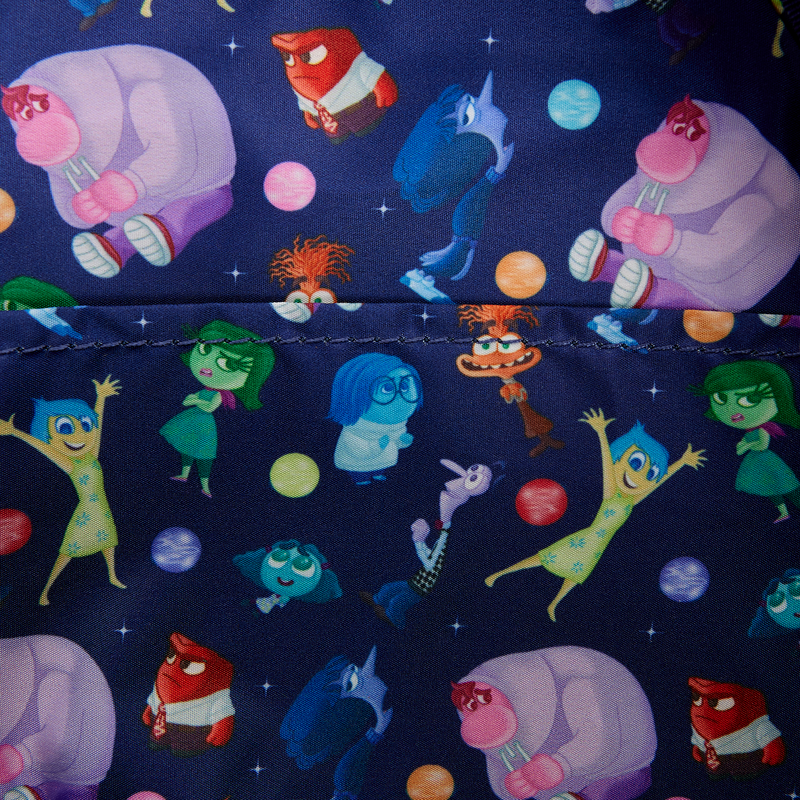 Patterned fabric with colorful cartoon characters on a dark blue background