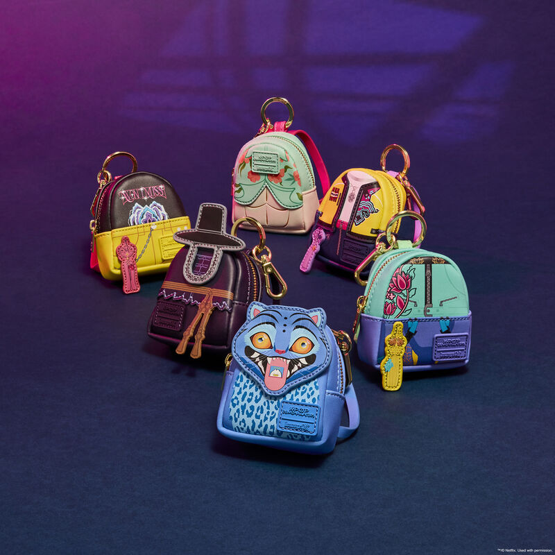 Collection of colorful keychains on a dark background