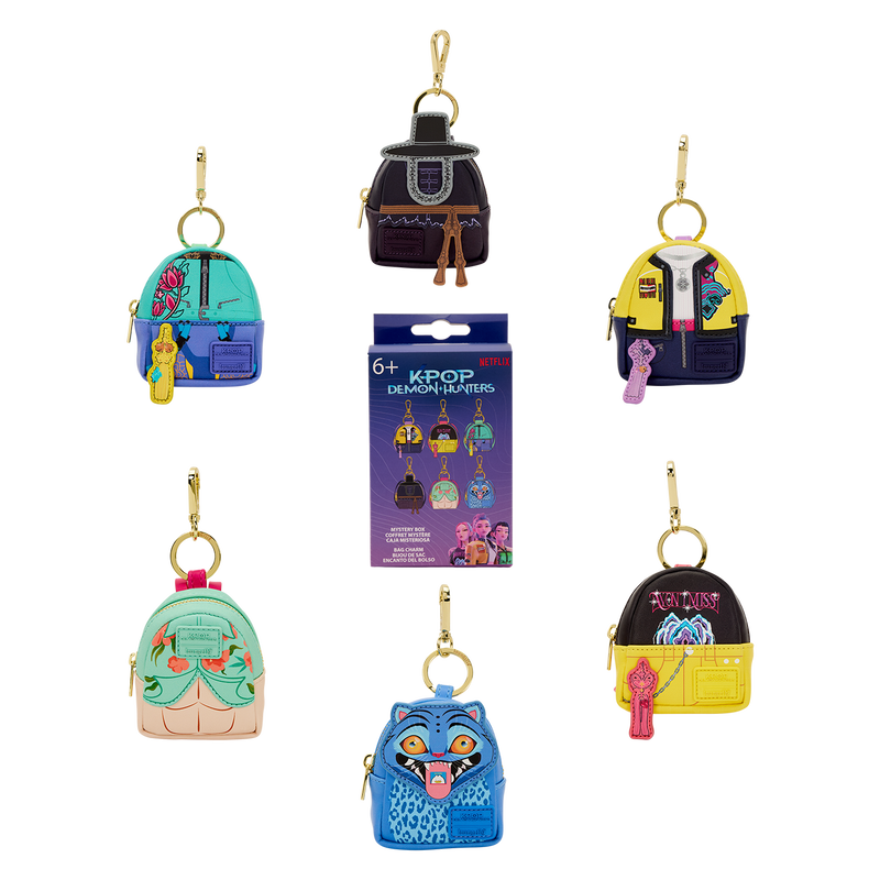 Collection of colorful backpack-shaped keychains on a white background