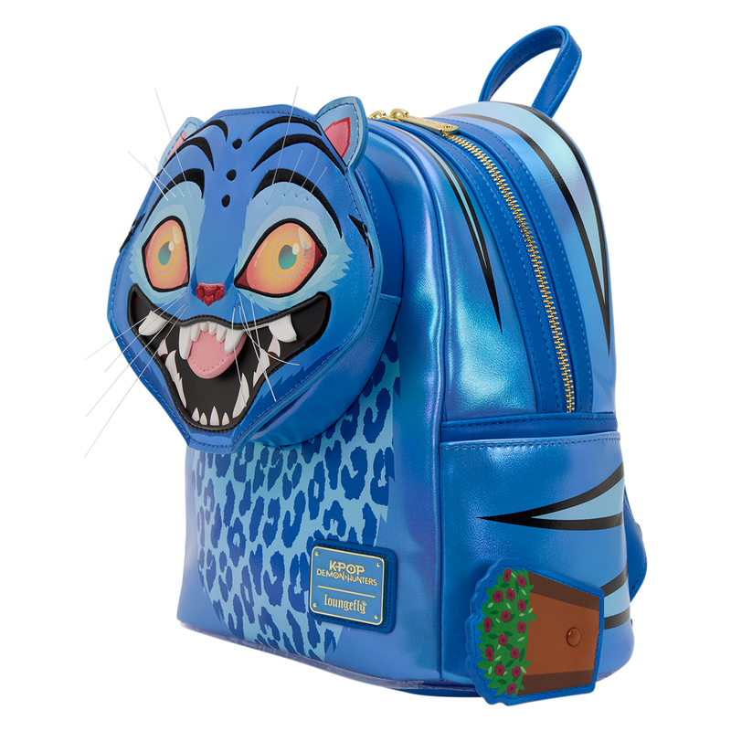 Blue backpack with a cartoonish cat face design on a white background