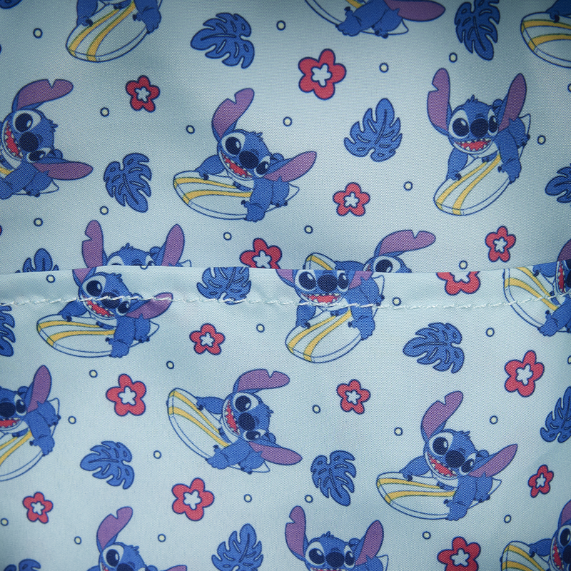 Patterned fabric with cartoon character on a light blue background