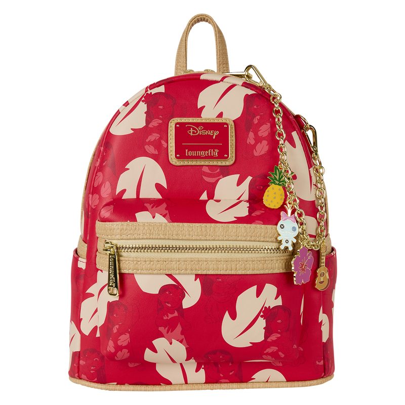 Red backpack with floral pattern and charm on a white background