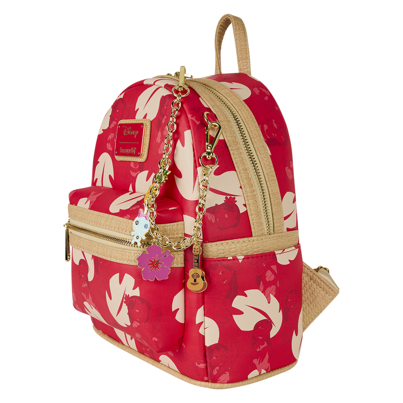 Red floral-patterned backpack with gold accents and a keychain on a white background