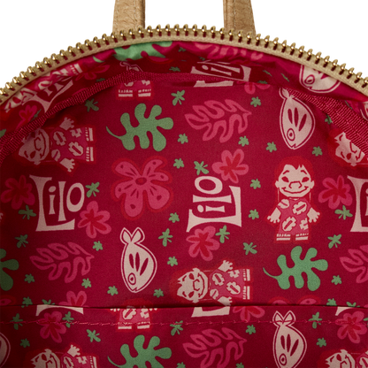 Close-up of a red fabric with 'Lilo' and floral patterns, likely from a Disney product.