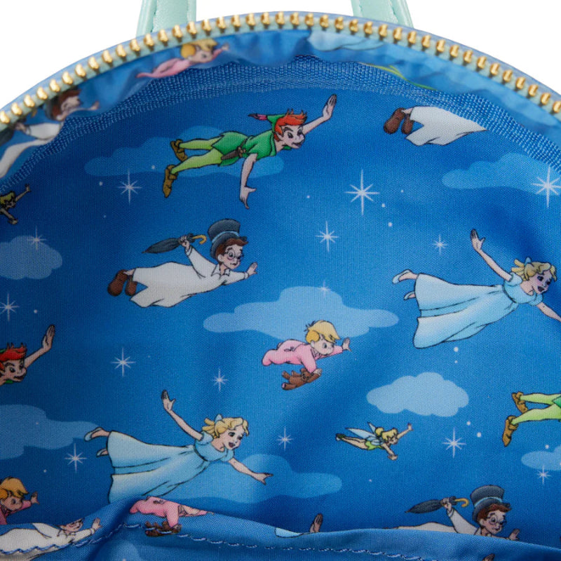 Close-up of a blue fabric with animated character pattern on a white background