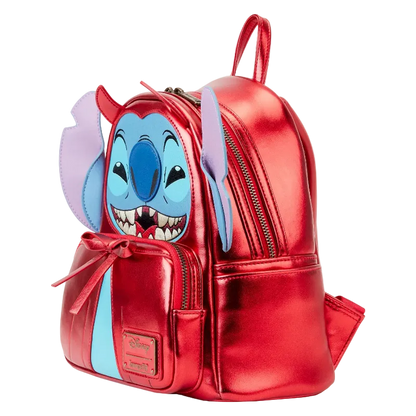 Red metallic backpack with cartoon character face on a white background