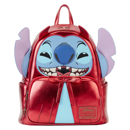 Red metallic backpack with a cartoon character face on a white background
