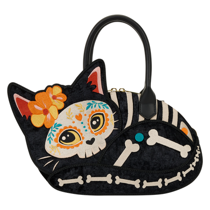 Cat-shaped handbag with sugar skull design on a white background