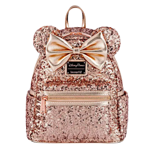 Rose gold glitter backpack with a bow on a white background