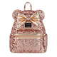 Rose gold glitter backpack with a bow on a white background