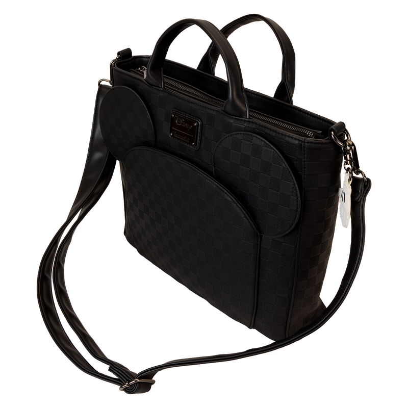 Black quilted handbag with a shoulder strap on a white background