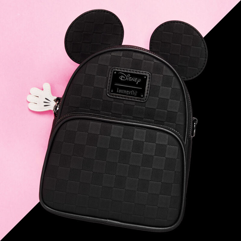 Black checkered backpack with mouse ears on a pink and black background