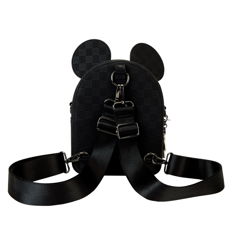 Black backpack with checkered pattern and straps on a white background