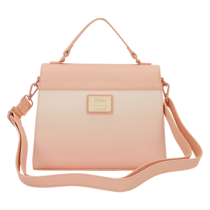Pink crossbody bag with a visible brand logo on a white background