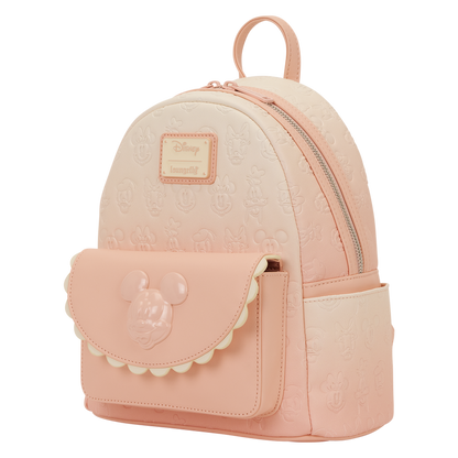 Pink backpack with a character design on a white background