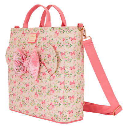 Pink floral backpack with a bow on a white background