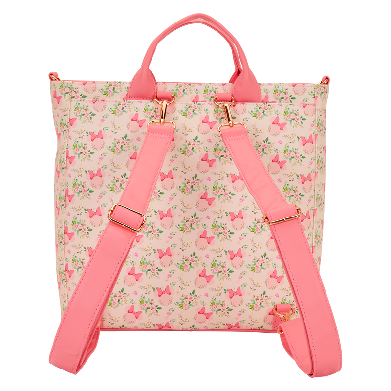 Backpack with pink floral pattern and straps on a white background