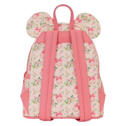 Floral-patterned backpack with pink accents on a white background